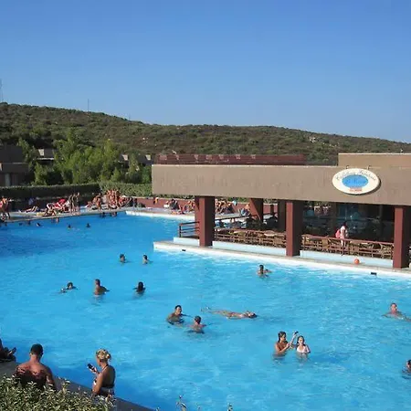 Centro Vacanze Cugnana Lägenhetshotell Portisco