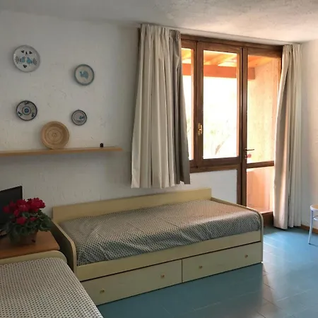 Centro Vacanze Cugnana Ξενοδοχείο με διαμερίσματα